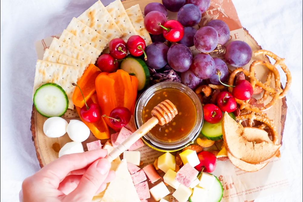 Elevate Your Cheese Board with Alexandra's Pikliz Infused Hot Honey